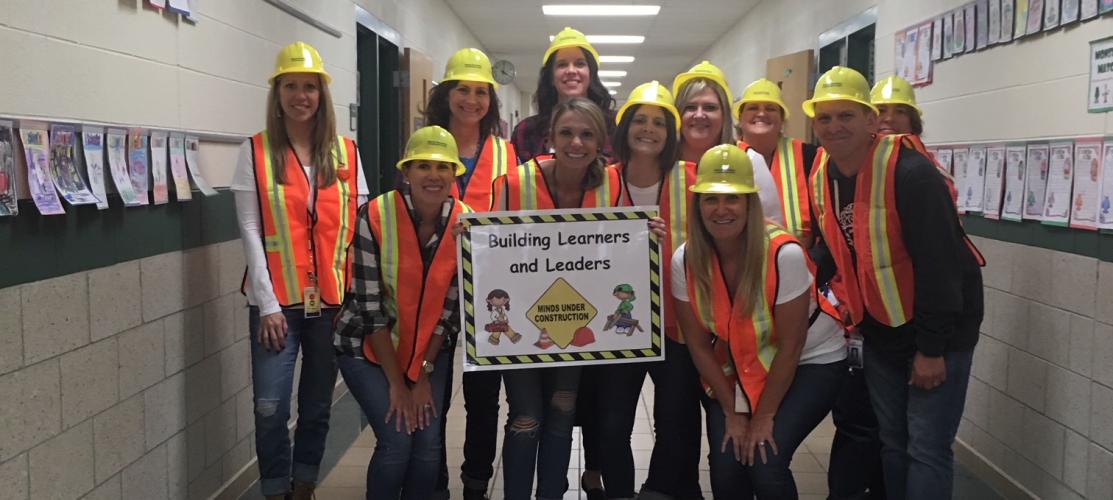 Staff wearing Halloween costumes, Building Learners and Leaders