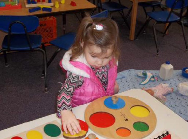 Child learning about circles and colors