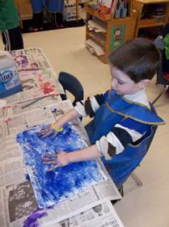 Boy Finger Painting